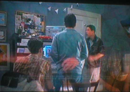 This is the same room, they just had to use some of the wallpaper to make shirts.